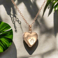 Heart-Shaped Pendant with Paw Engraving