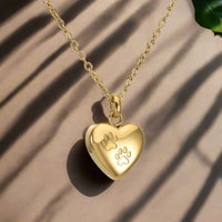 Heart-Shaped Pendant with Paw Engraving