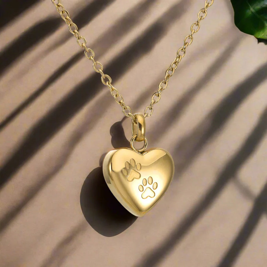 Heart-Shaped Pendant with Paw Engraving
