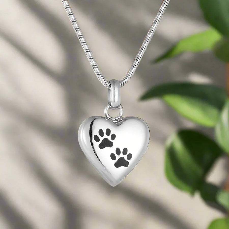 Heart-Shaped Pendant with Paw Engraving