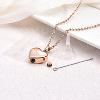 Heart-Shaped Pendant with Paw Engraving